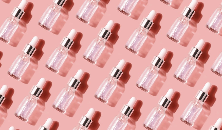 dropper vials of skincare serum with active ingredients that will transform skin