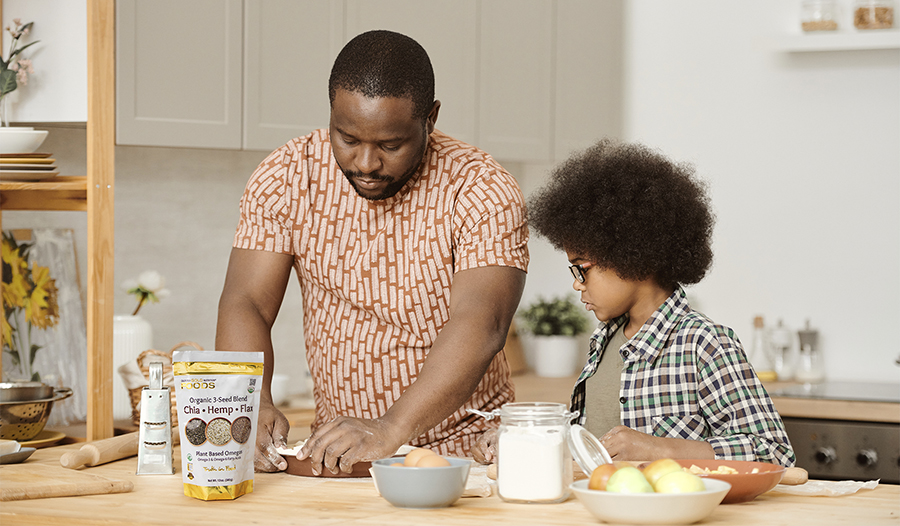 Dad and daughter baking in kitchen