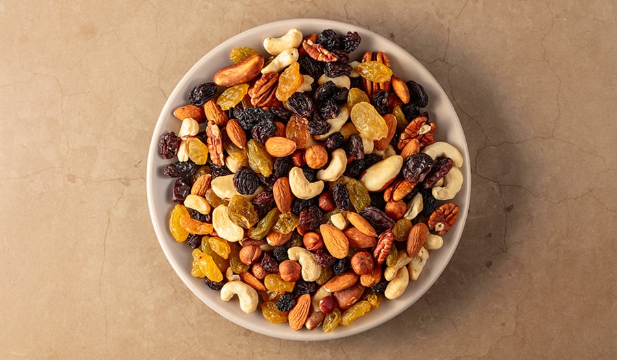 Mixed nuts and dried fruit in bowl