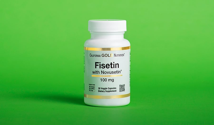 Fisetin supplement on green background