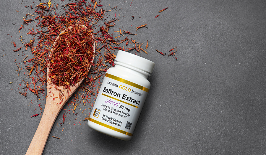 Saffron spice on table and saffron extract supplements
