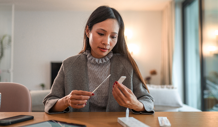 Woman taking at home test