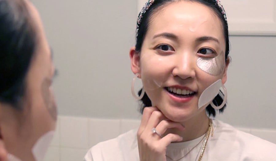 woman with different masks on parts of face