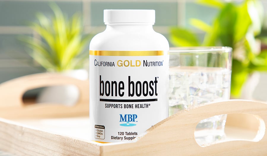 Bone Boost: Bone health supplement on wooden tray