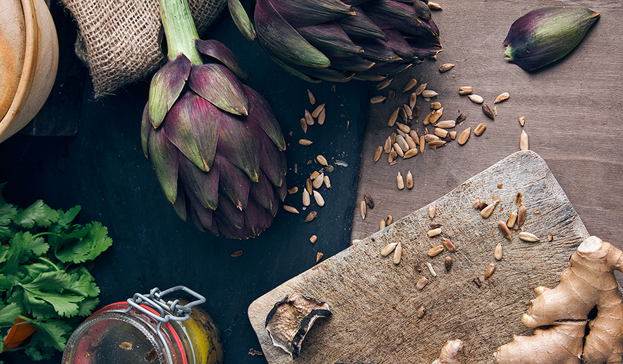 Artichoke and ginger on kitchen table